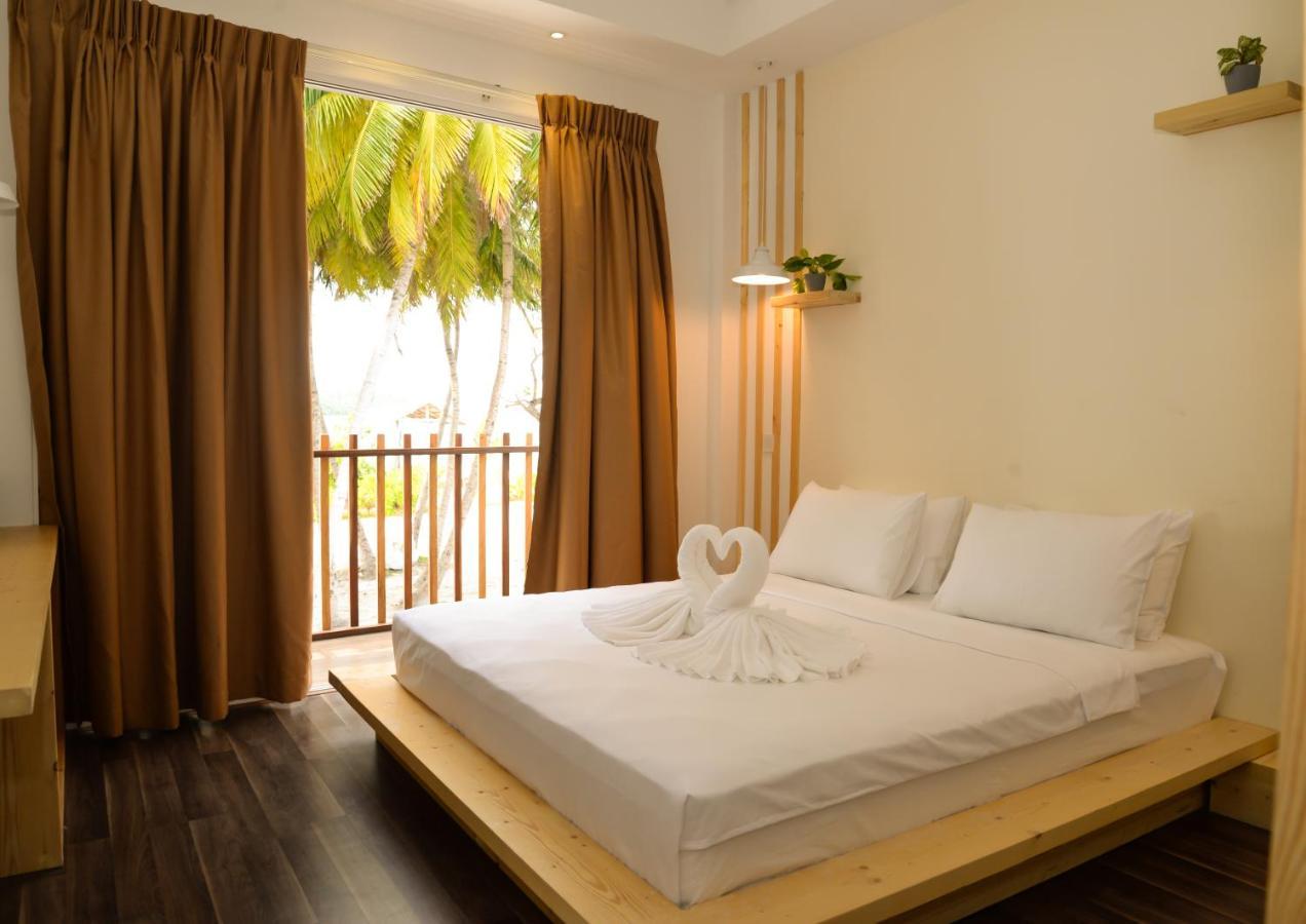 Portia Hotel & Spa Dhiffushi Exterior foto